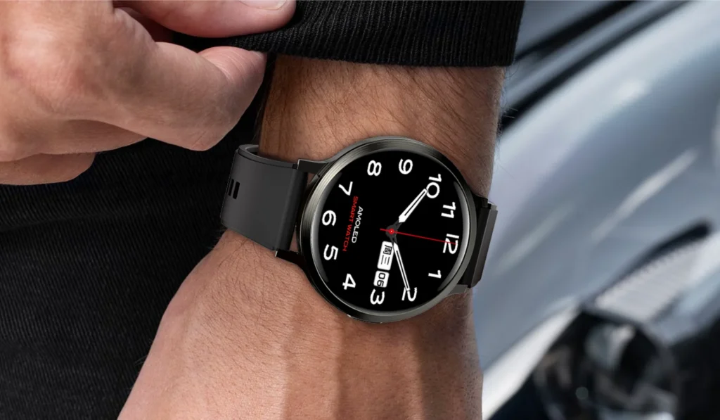 Close-up of a wrist adorned with a sleek smartwatch featuring a black strap and a clear AMOLED display with bold white numerals.