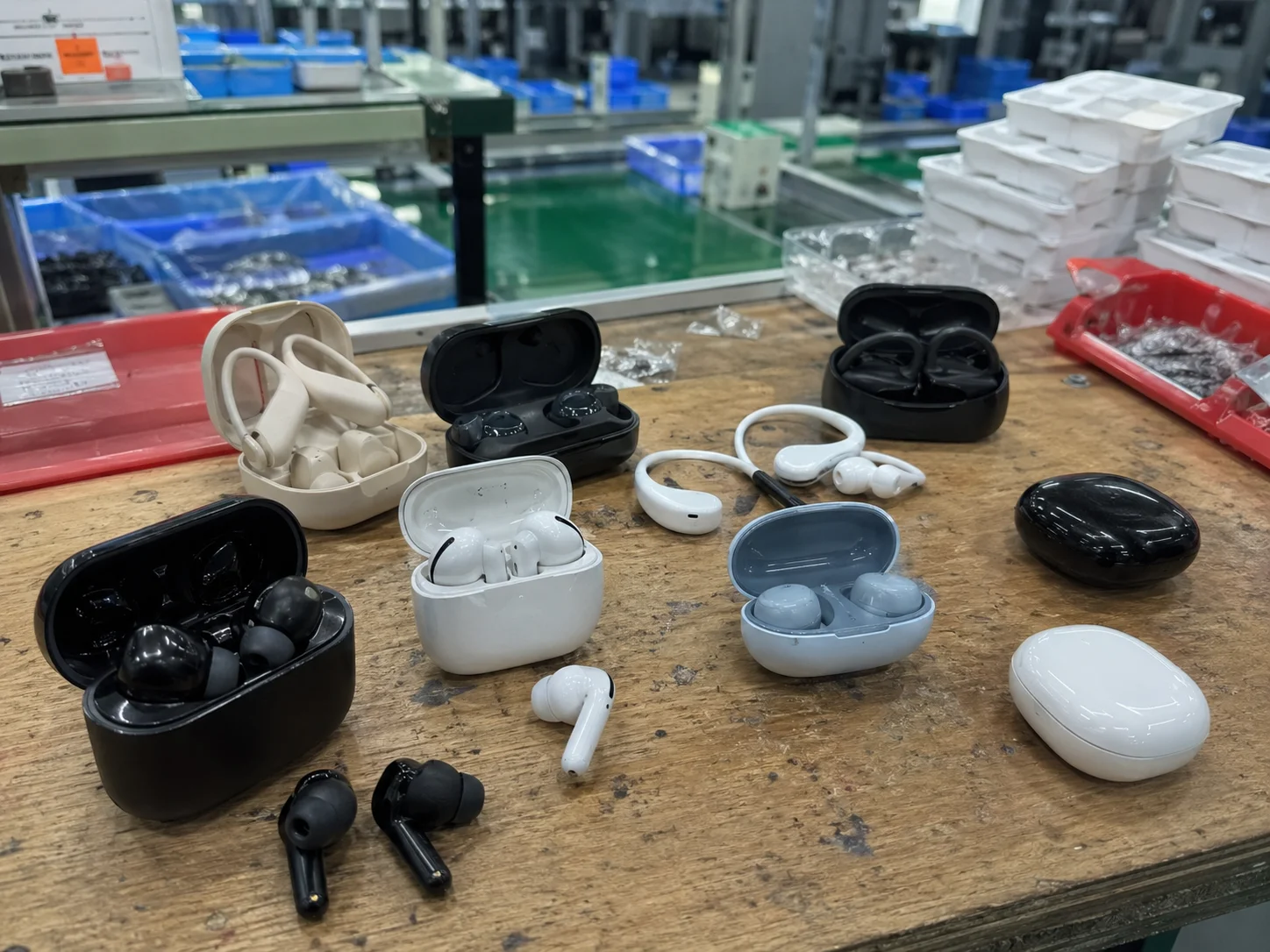 OEM TWS Earbuds Comparison A collection of different OEM TWS earbuds on a clean background