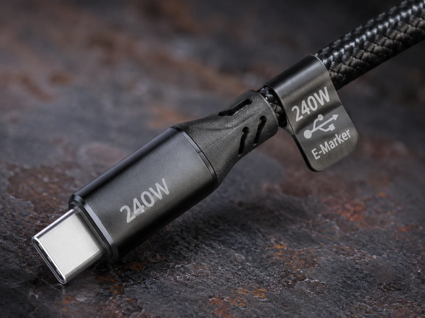 E-Marker USB-C Cable a close-up of a USB-C cable with a 100W or 240W icon on it
