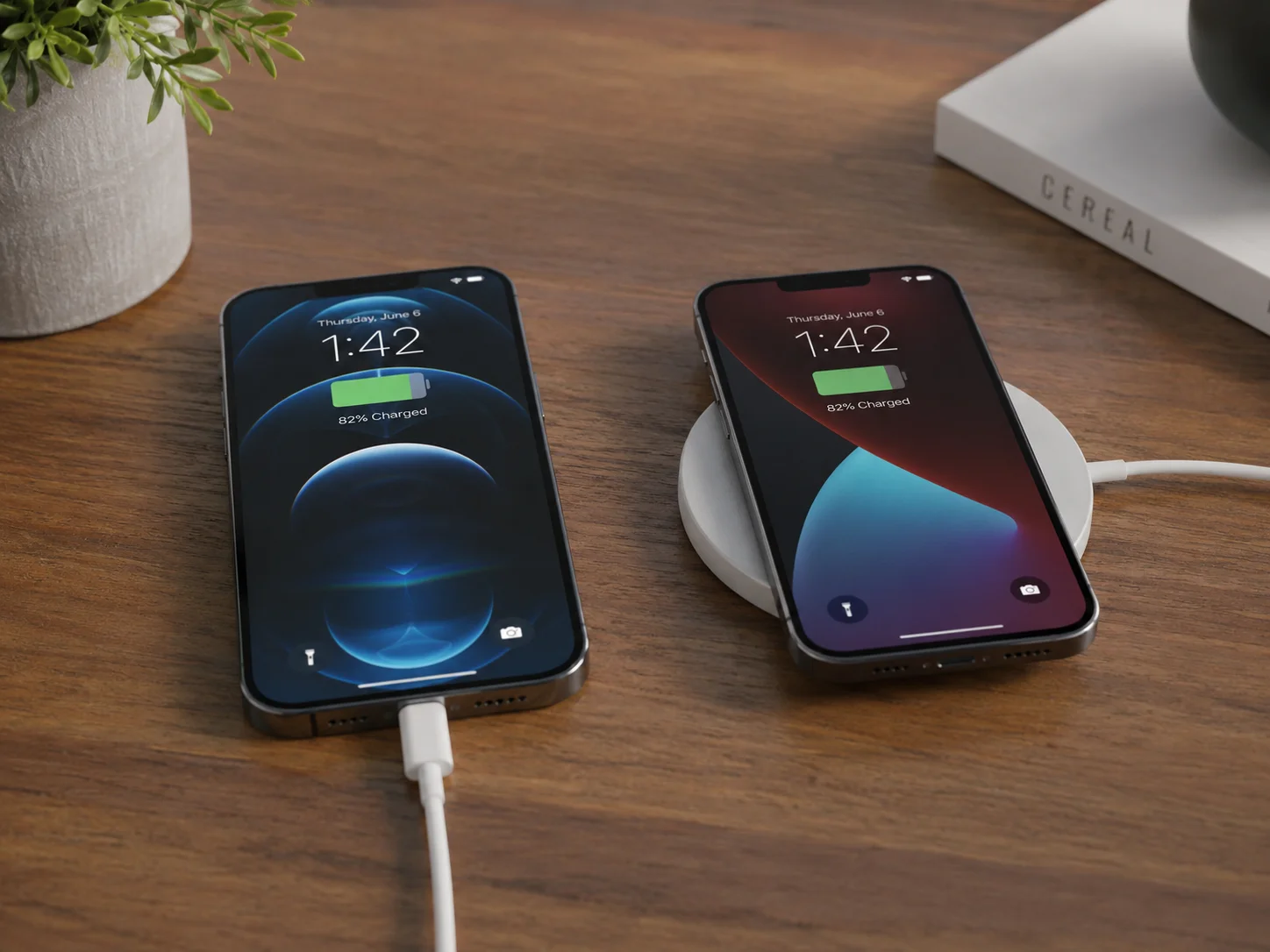 An iPhone charging with a USB-C cable next to one on a MagSafe charger