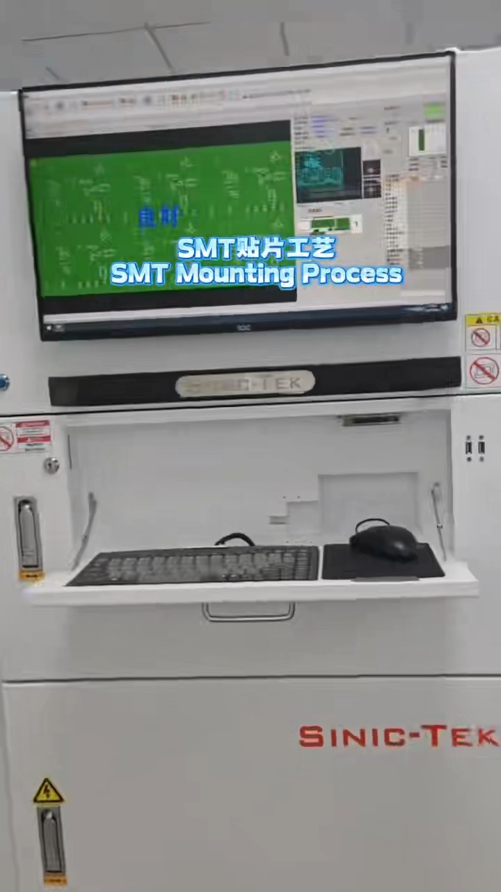 SMT mounting equipment placing components on charger circuit boards