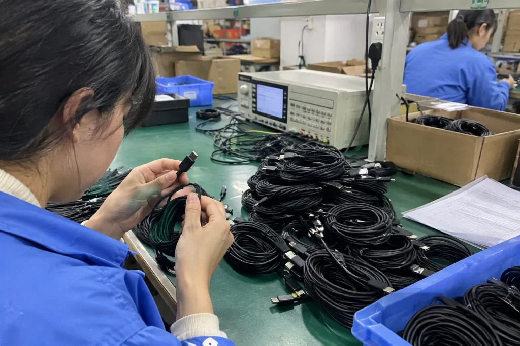 Order Online USB Cable Factory 8k+ — realistic product and workbench photograph — Featured